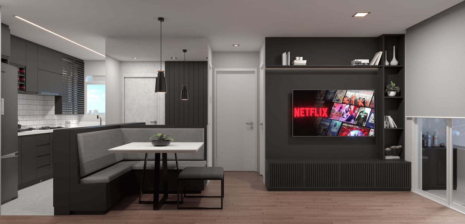 Sala integrada do Apartamento Grafite com marcenaria escura e painel de TV